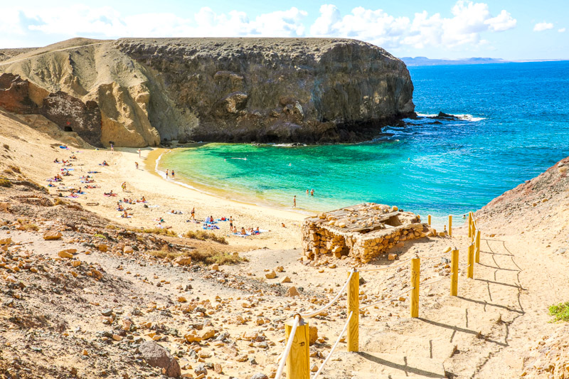 Flight of steps to amazing Playa Papagayo beach in Lanzarote, Canary Islands