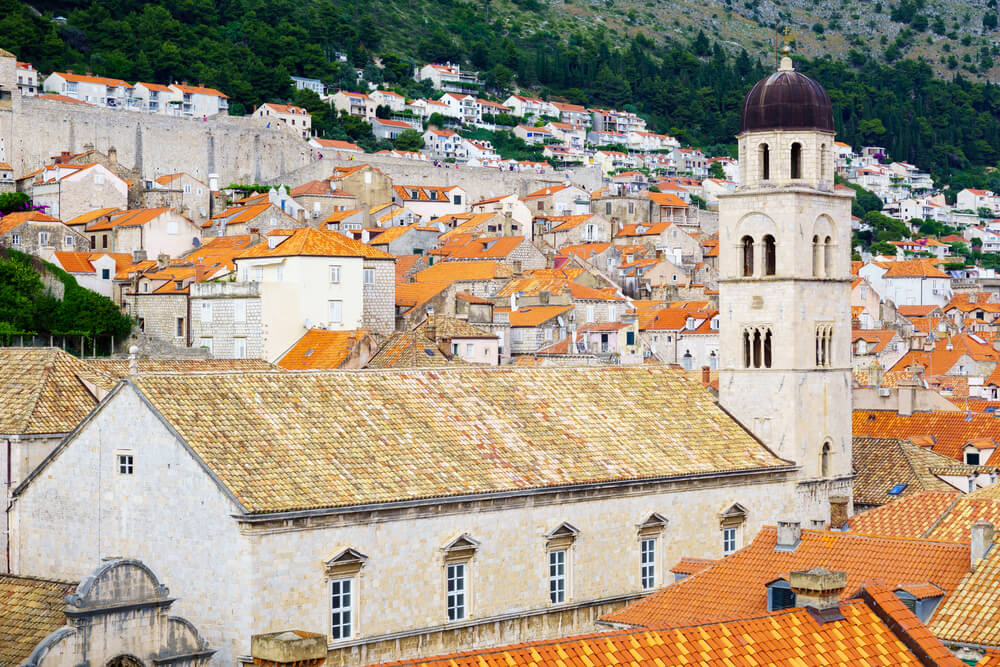 monastery in a sea of orange roofed buildings