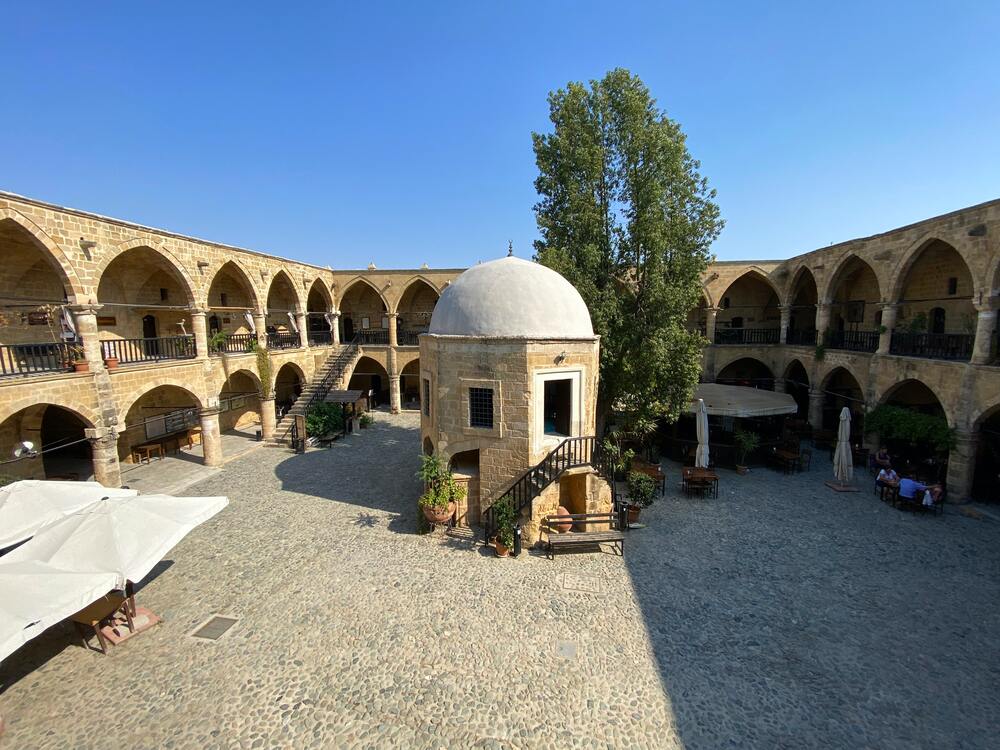 courtyard of monastery with small domed building in the middle