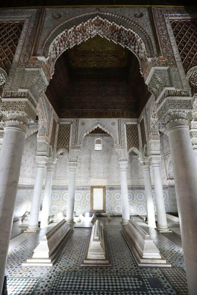 white marble columns, tombs and elaborate roof of the saadian tombs