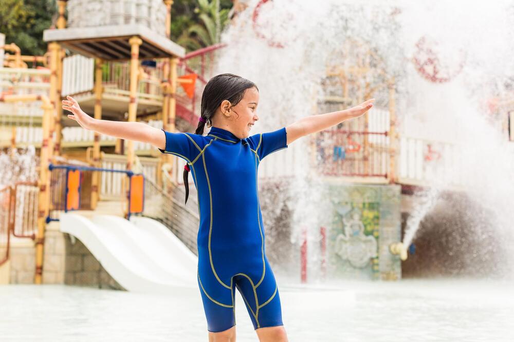 The kids playing in water attractions in Siam waterpark in Tenerife, Spain