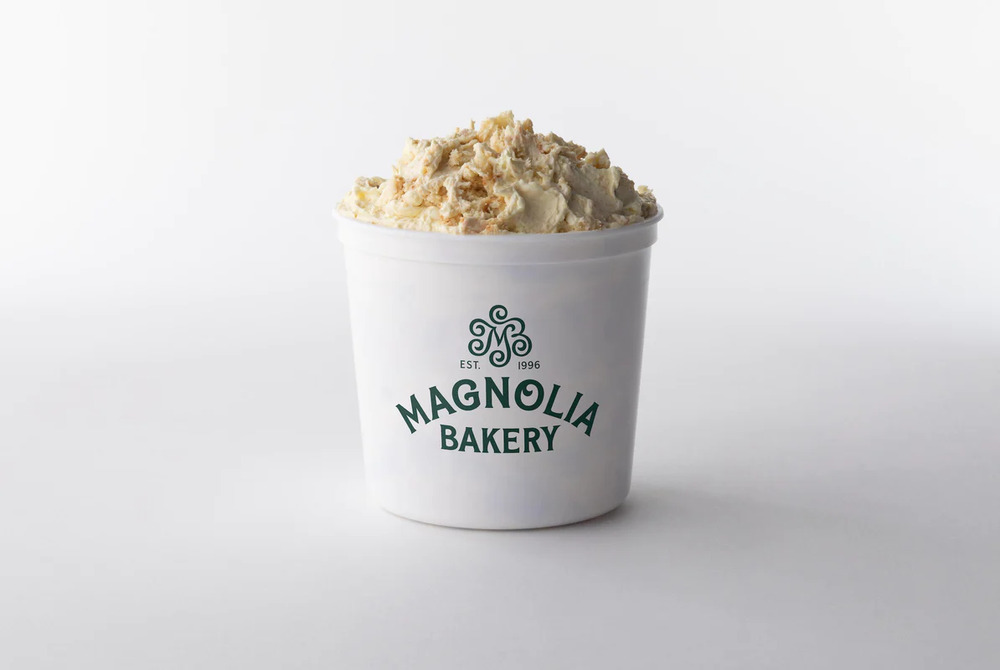 bowl of banana pudding in cup with magnolia bakery label