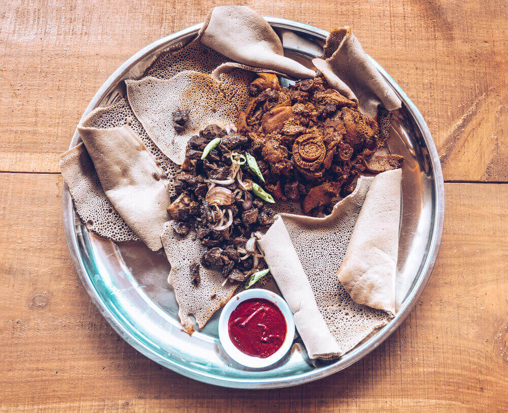 plate of ingera and Ethiopian food