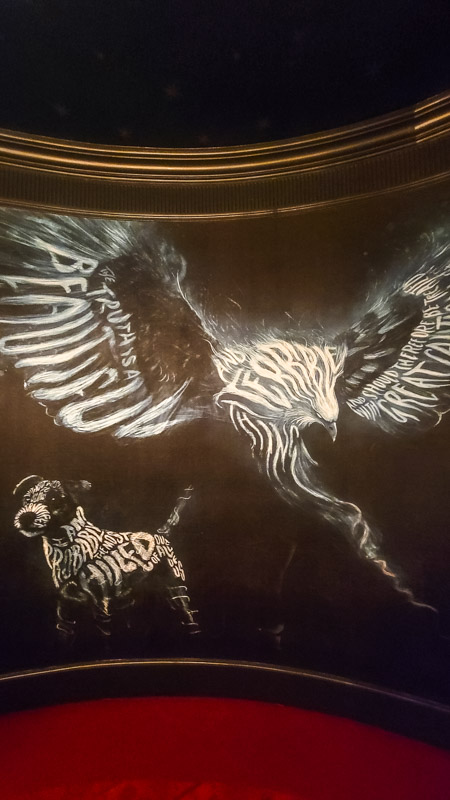 eagle and dog painting on wall