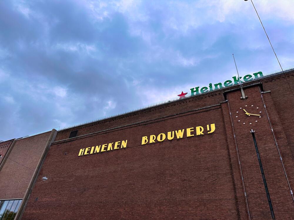sign on brick building that says heineken brouwery