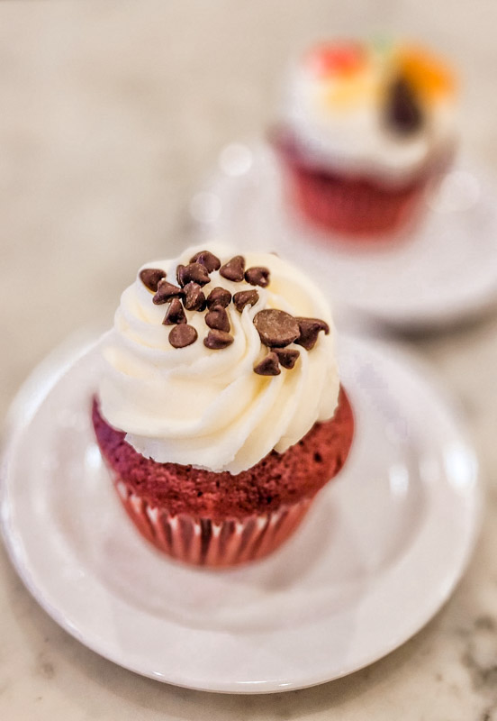 plate of red velvet cupcakes