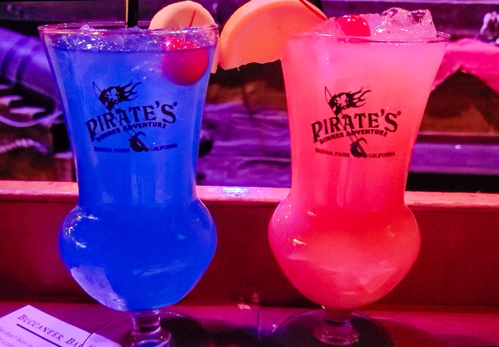 Two rum cocktail glasses at a pirate show