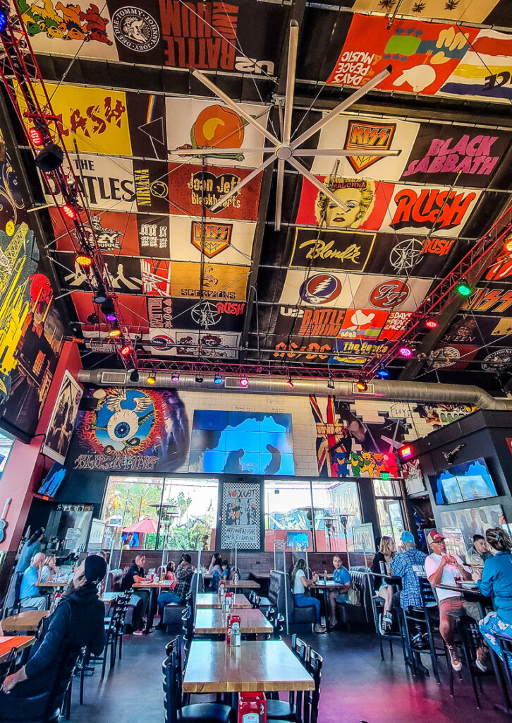 People dining in a rock and roll themed restaurant.