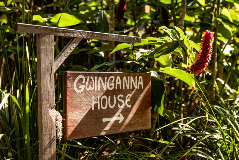 Sign that says Gwinganna house in the forest