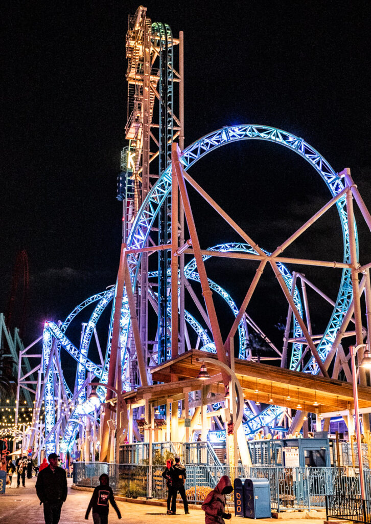 hangtime roller coaster lit up at night