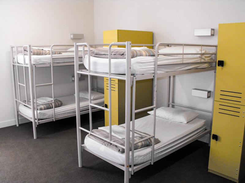 two bunk beds in dorm room at sydney harbour yha
