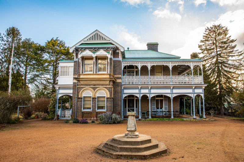Exterior view of the heritage-listed Saumarez Homestead building in Armidale.