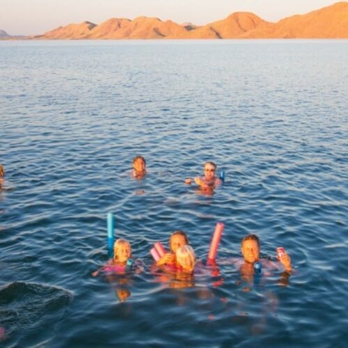 makepeace family swimming in lake argyle