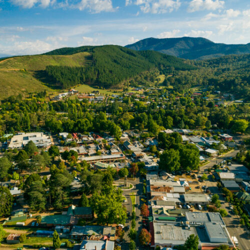 aerial of bright town amongst the mountains