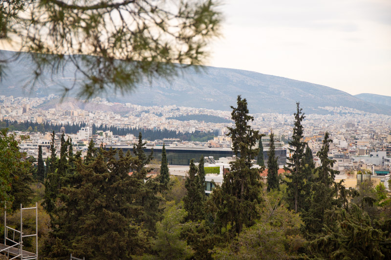 view of athens between the trees