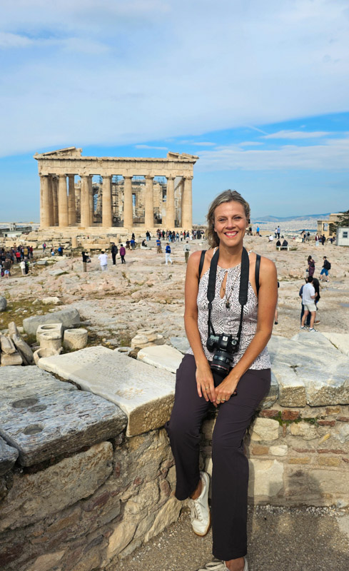 caz sitting in front of the Parthenon in Athens