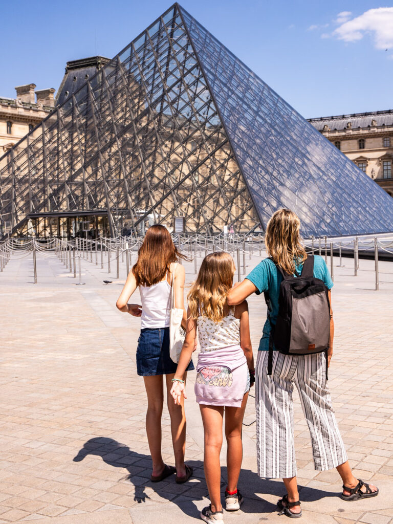 Mom and two daughters at the Louvre Museum in Paris