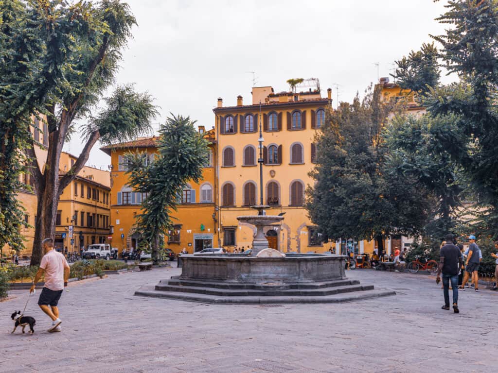 fountain in the middle of Piazza Santo Spirito