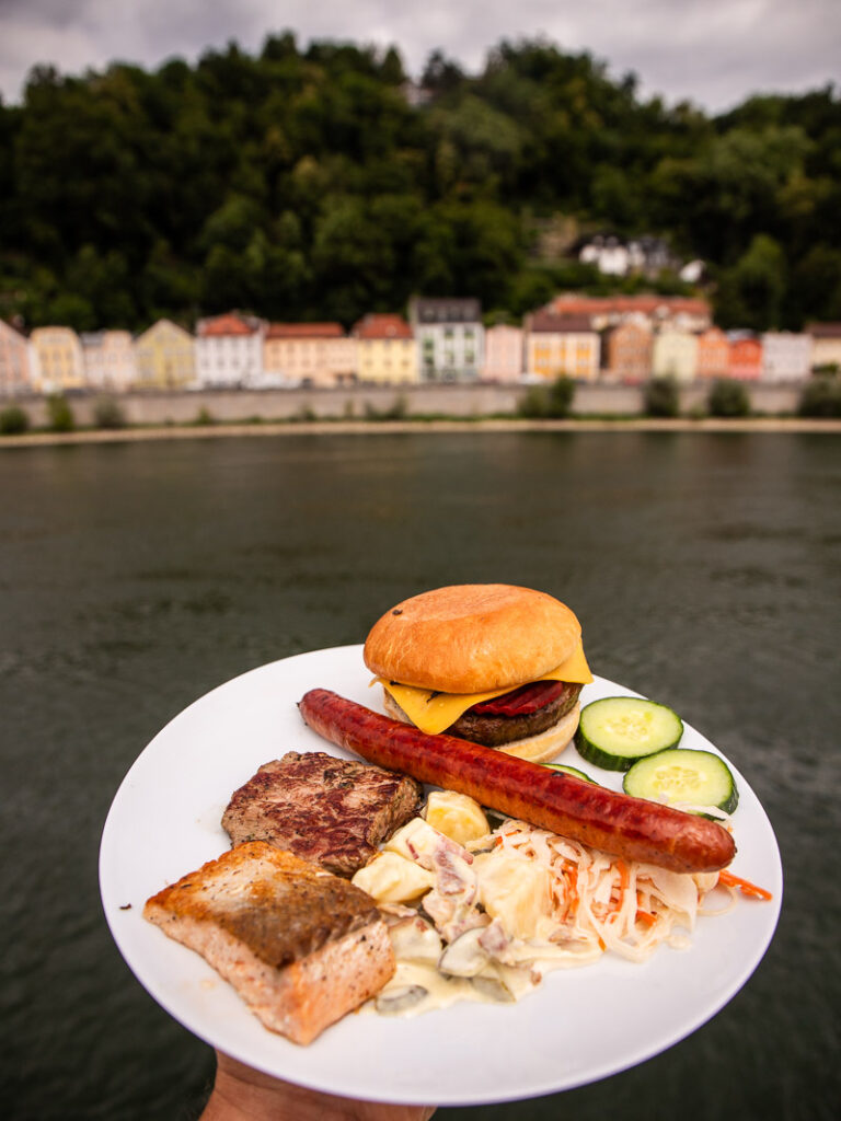 Plate of fish, sausages and a burger