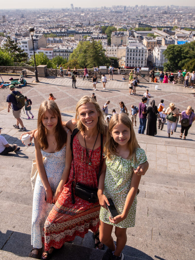 caz and girls posing in front of paris view