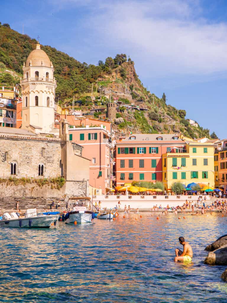 looking at colored buldings of vernazza from shore