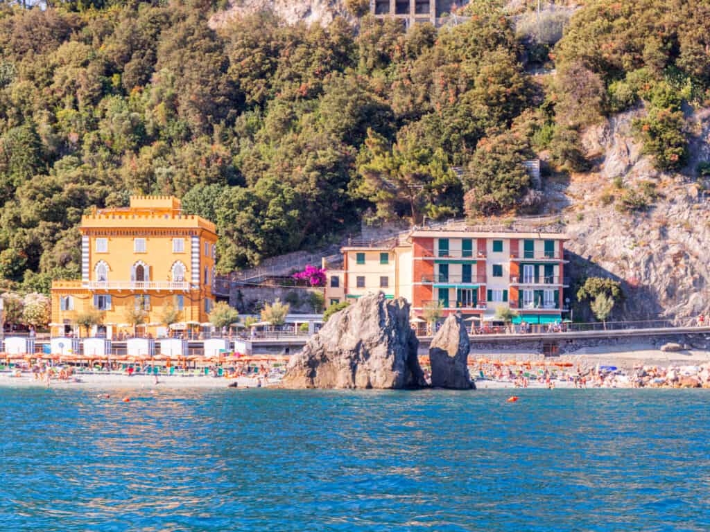 looking at monterosso beach and colored buildings from the ocean