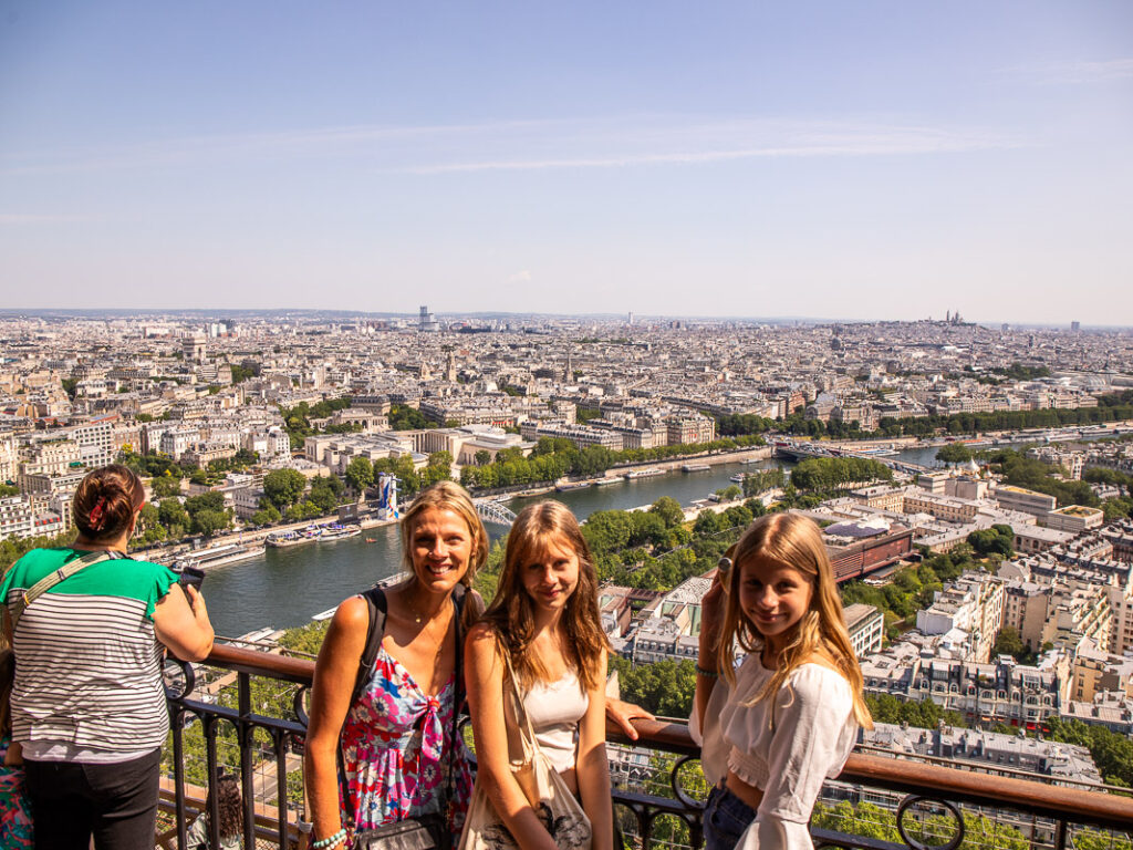 Mom and two daughters at the top of the Eiffel Tower