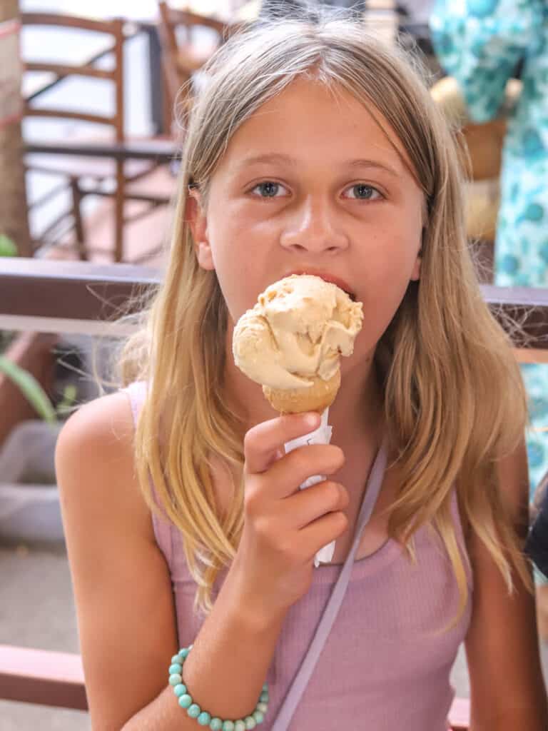 young girl eating gelato