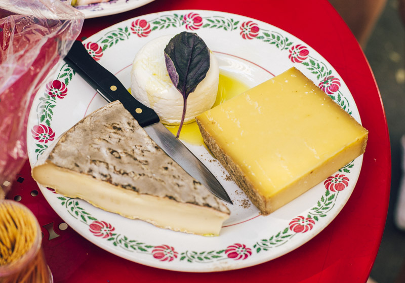 three different cheeses on plate