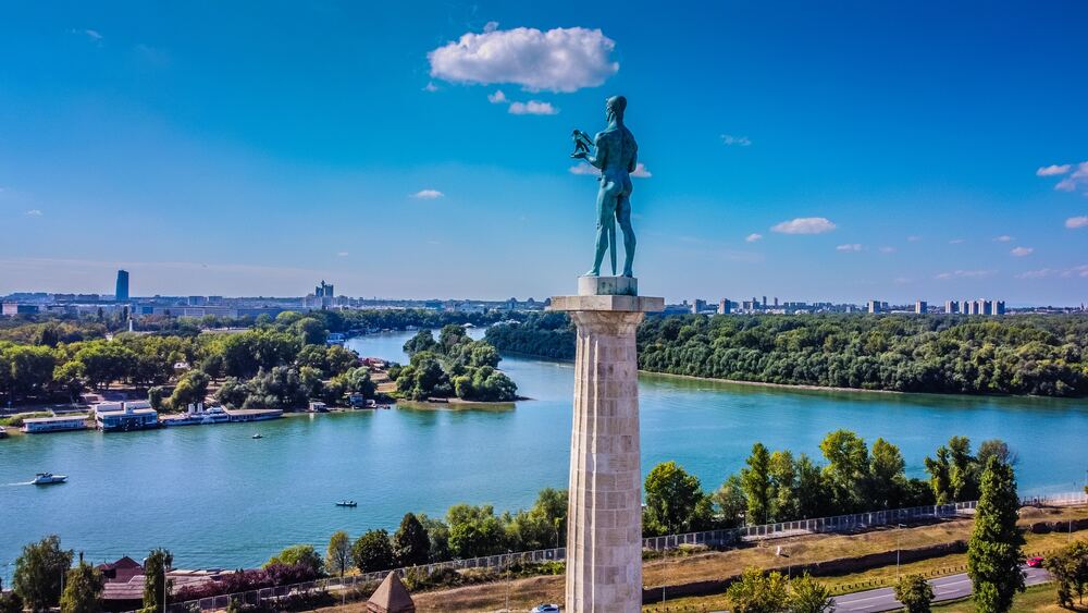 monument statue of man looking at river in belgrade