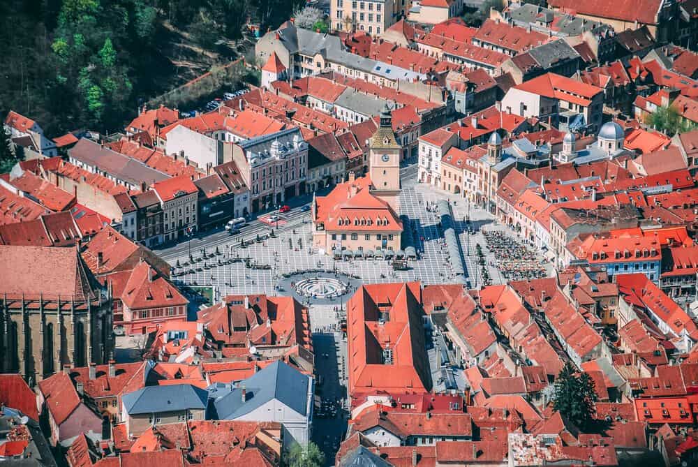 aerial view of red roofed homes in translyvania