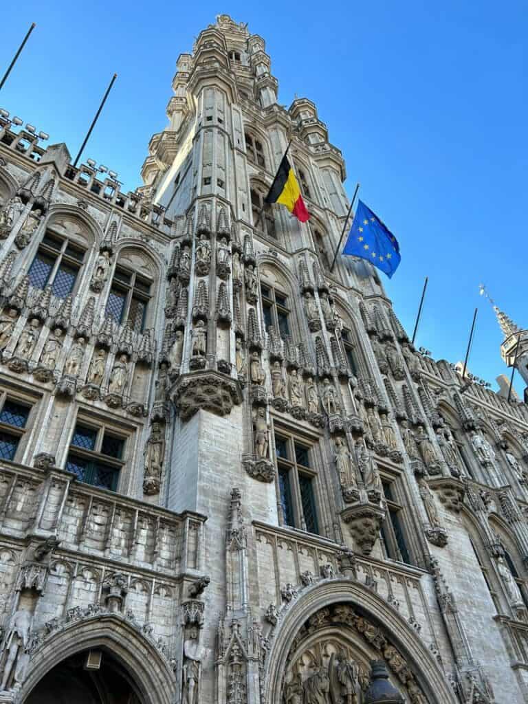 gothic exterior of building with flags flying