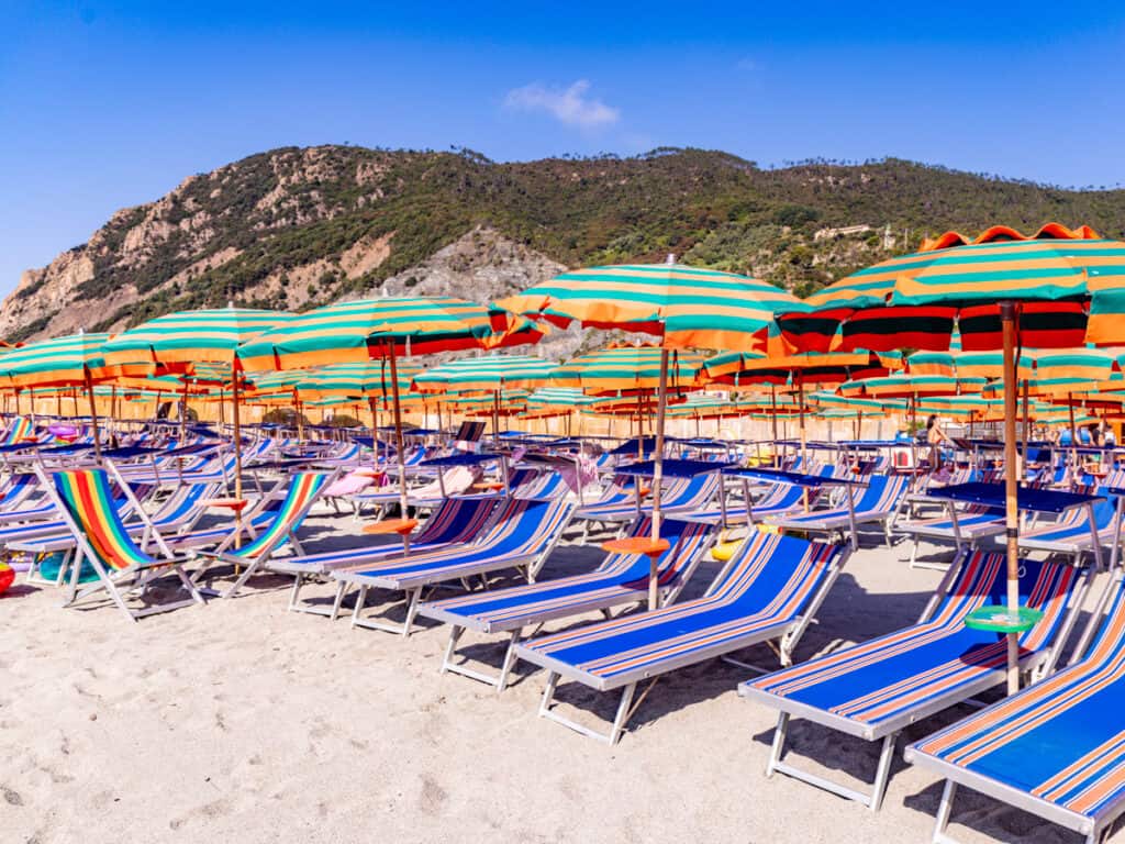 lounge chairs and umbrellas on beach