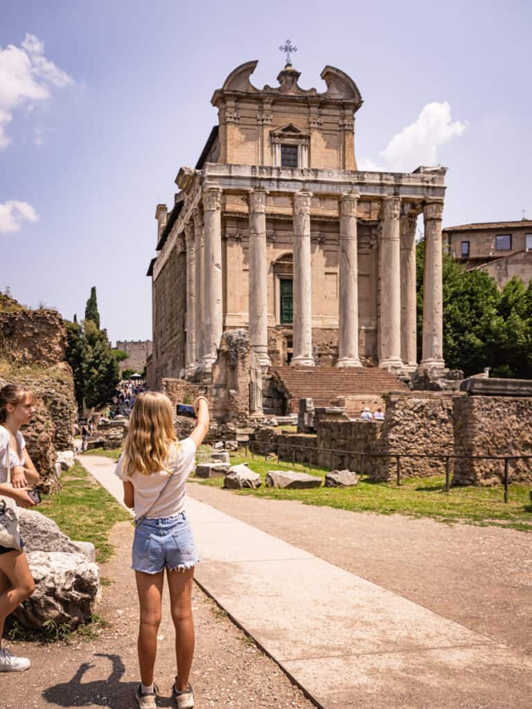 savannah taking a photo of Temple of Antoninus Pius