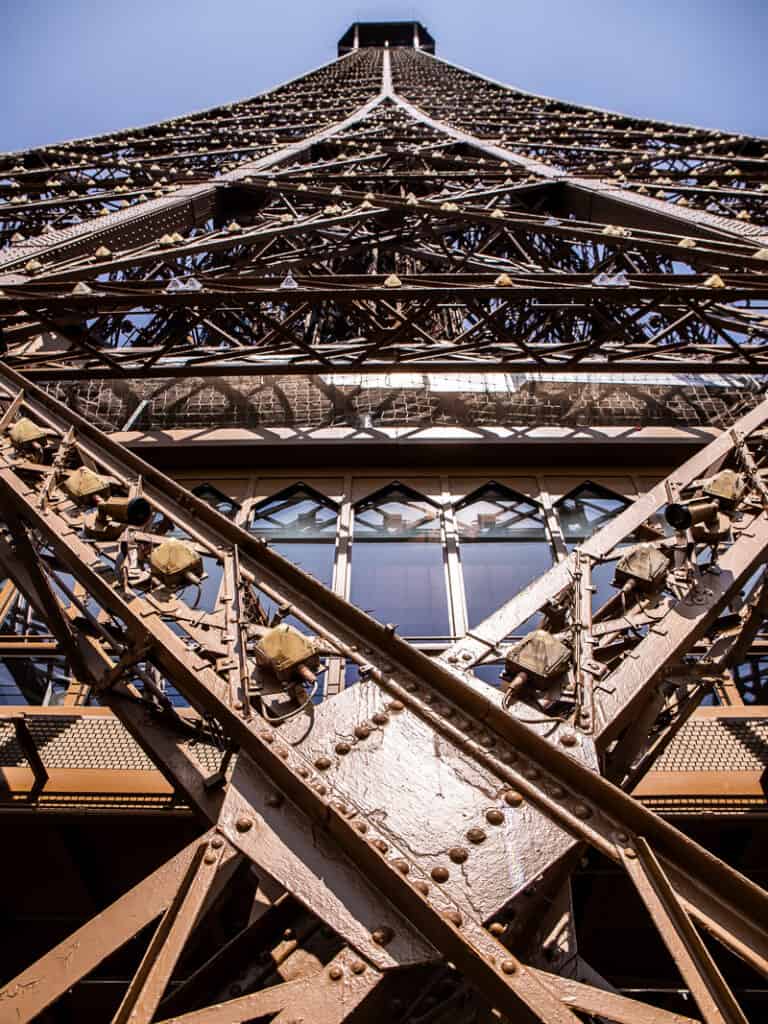 iron structure up close of  the eiffel tower