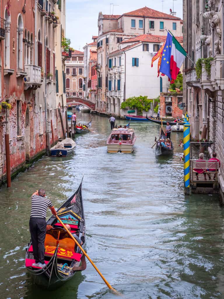 gondola rowing down canal 