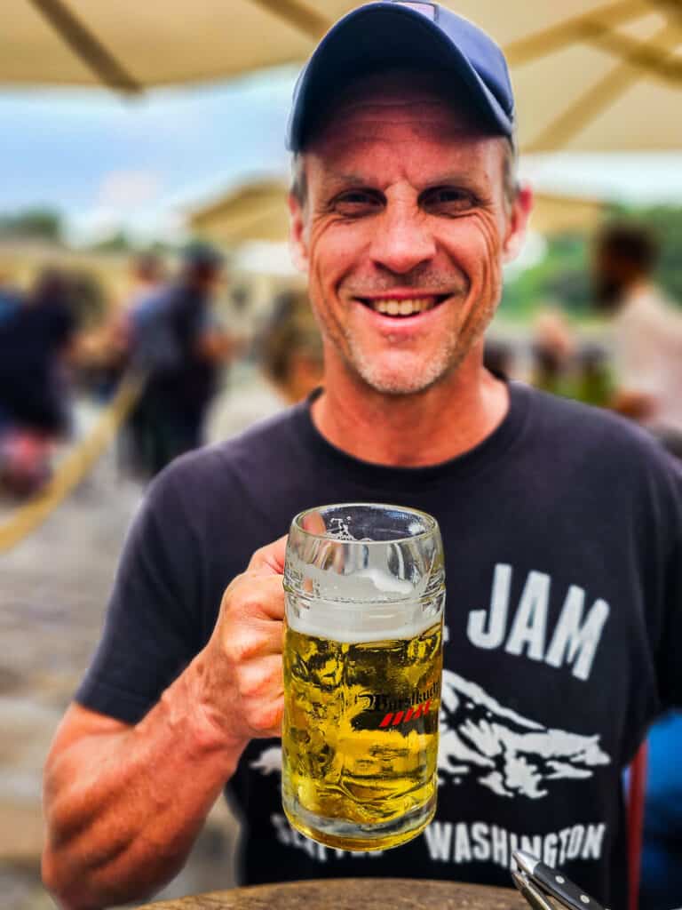 Man holding a glass of beer