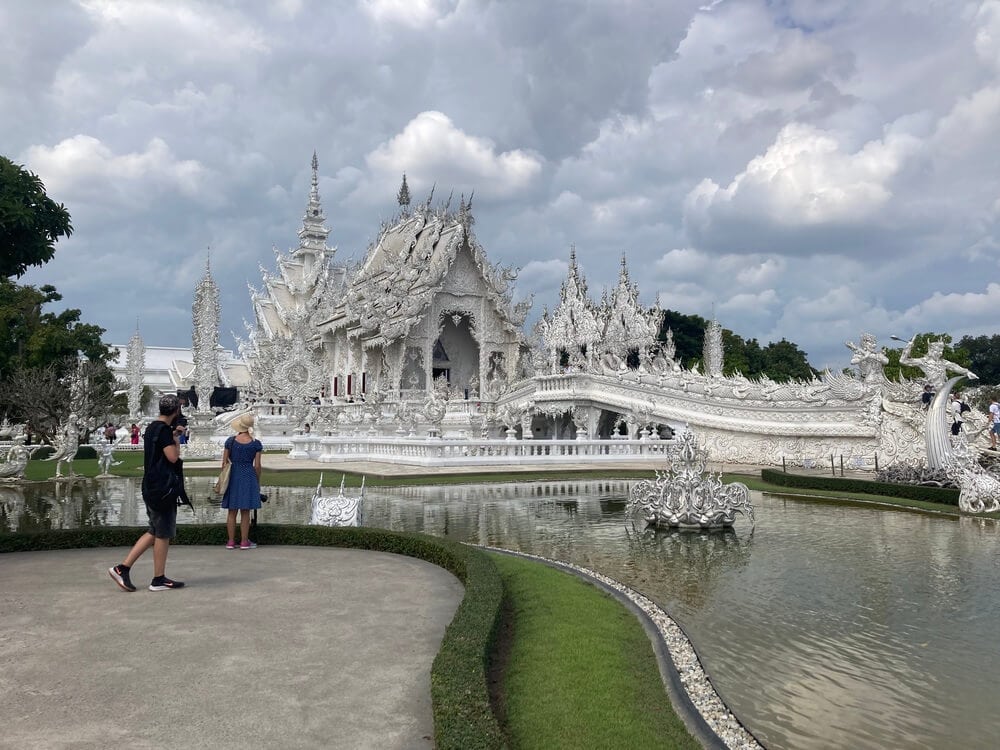 person looking at white temple