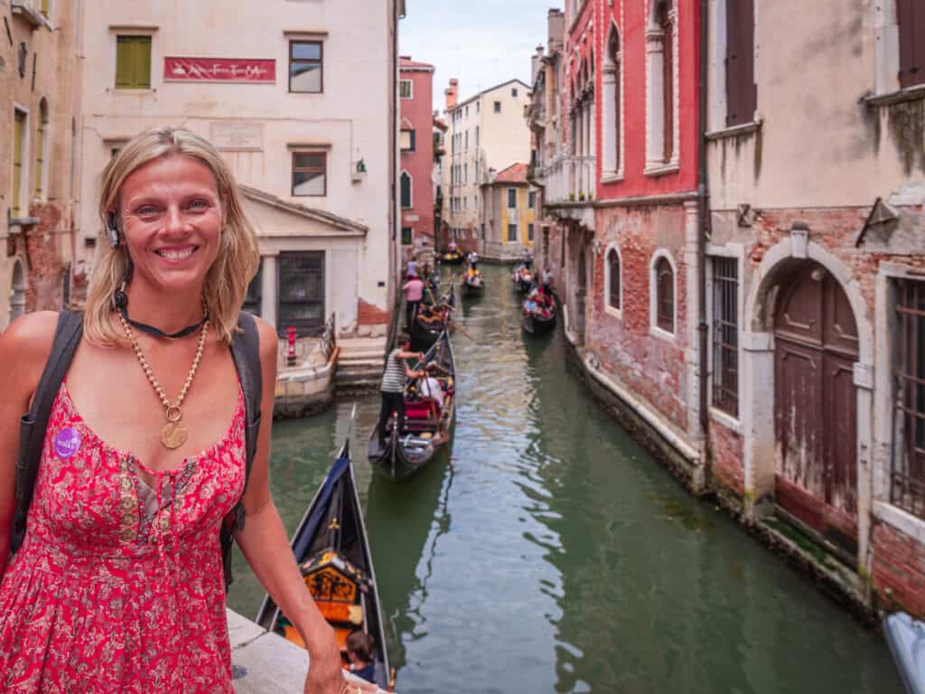 Caz smiling at camera with venice canal behind her