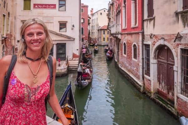 Caz smiling at camera with venice canal behind her