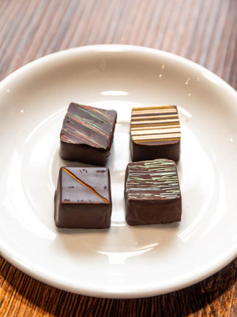 plate of small venetian squares of chocolate