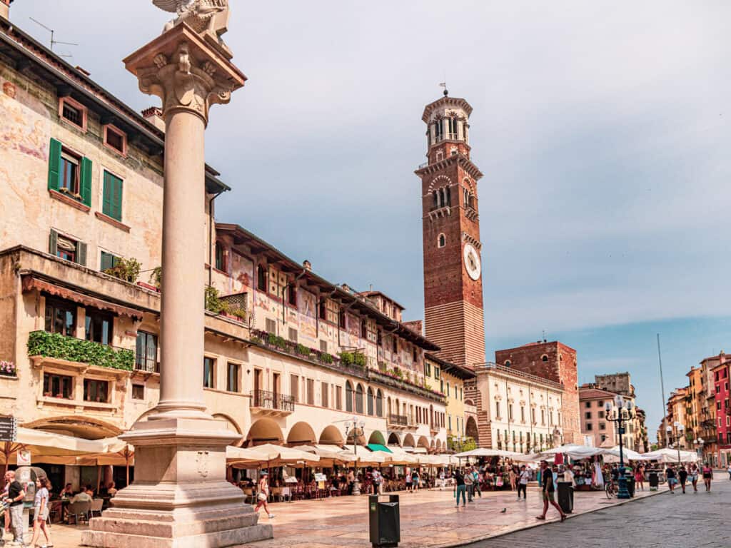 monuments, tower and restaurants on piazza erba