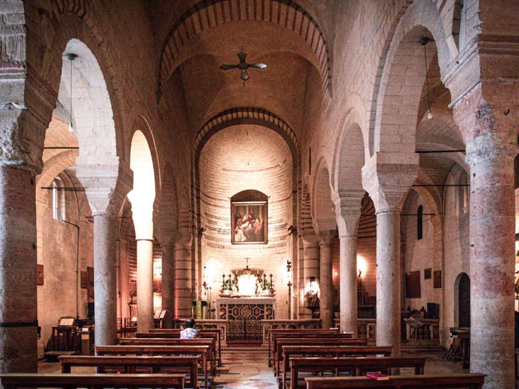 alter and pews inside of santa maria church
