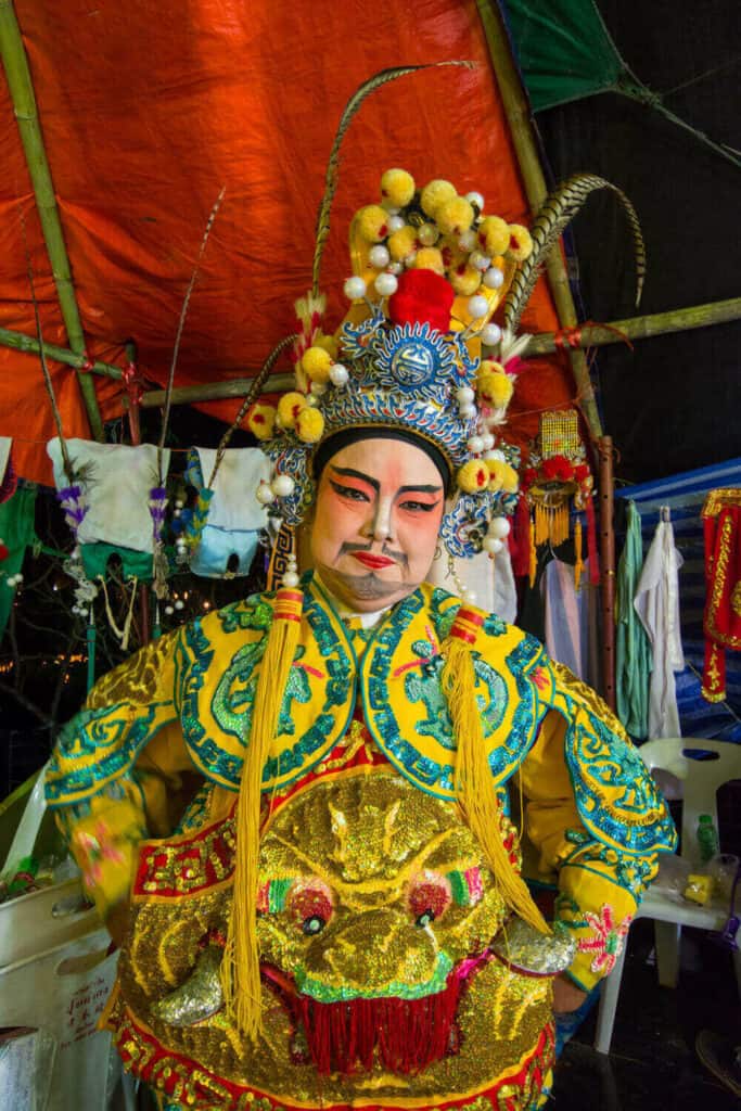 man dressed in costume for the chinese peking opera