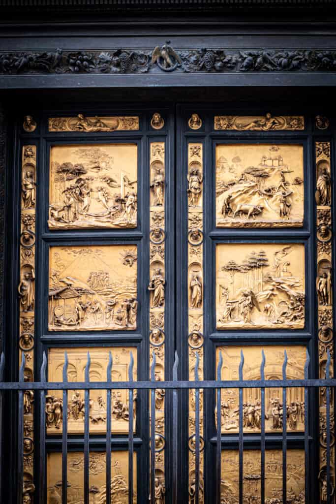 golden doors with carvings on them