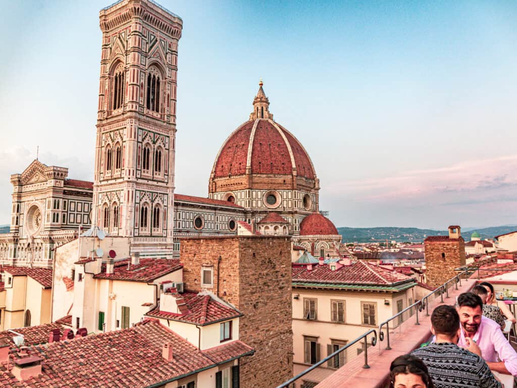 rooftop bar overlookng the dome and tower of florence duomo