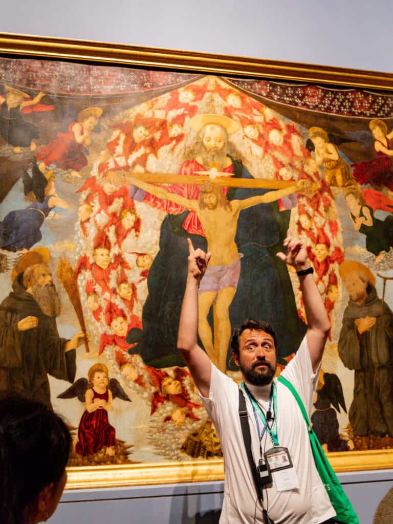 guide in front of jesus painting