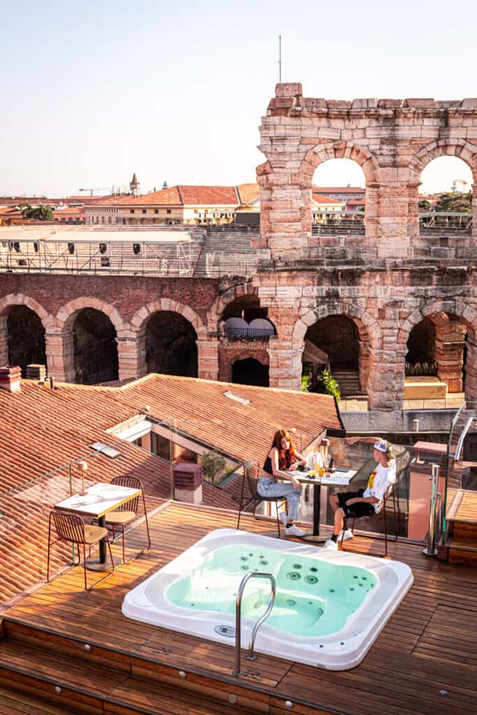 sap on rooftop with views of Verona arena