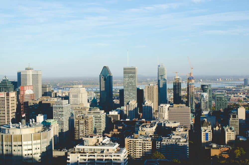 skyline of montreal with water in the background