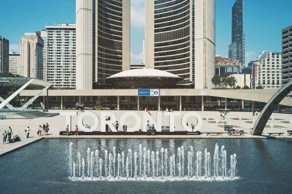 Nathan Phillips Square with Toronto sign and dancing fountain 